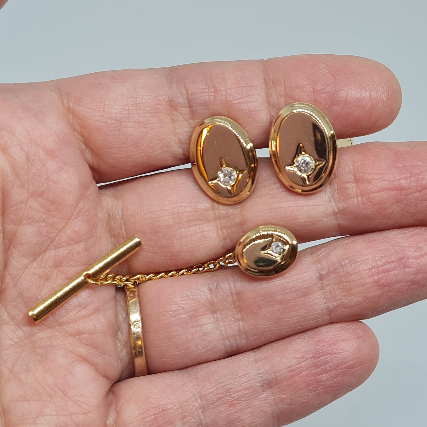 Vintage tiny cufflinks & tie tack set Gloss gold-tone oval cuff links with clear rhinestones