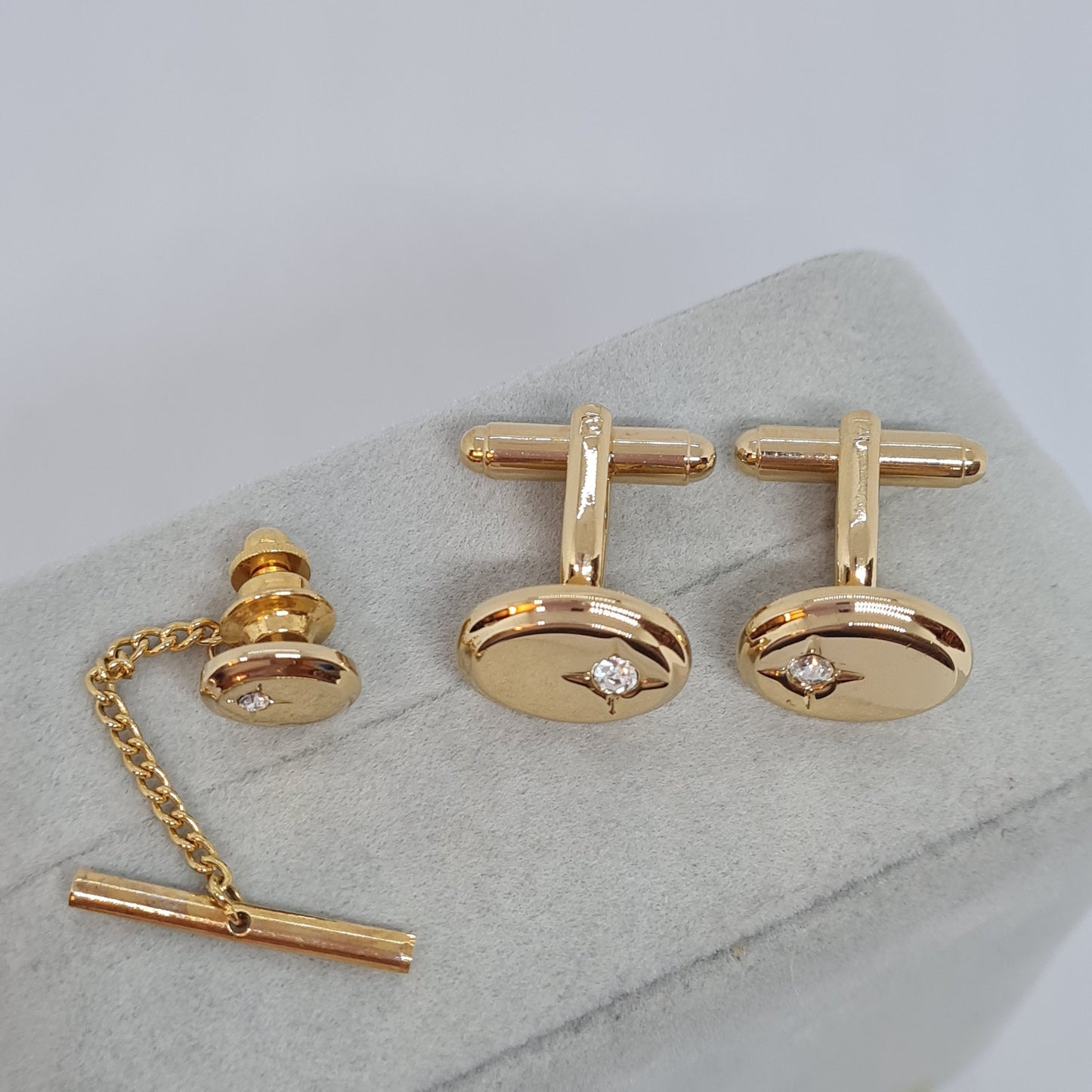 Vintage tiny cufflinks & tie tack set Gloss gold-tone oval cuff links with clear rhinestones