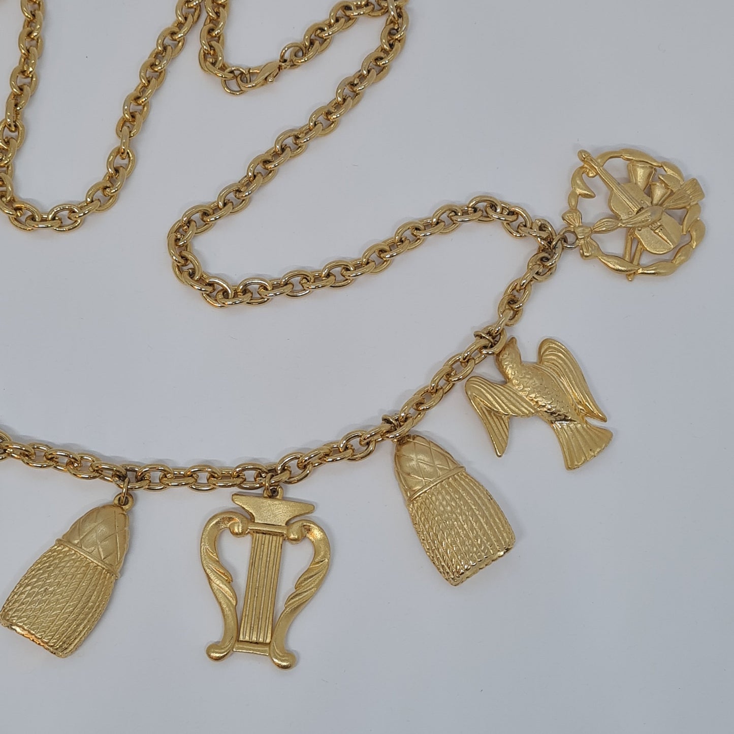 Vintage music-themed pendant necklace Gold-tone metal chain with Arfa, tassel, mask, violin pendants Original pendant necklace