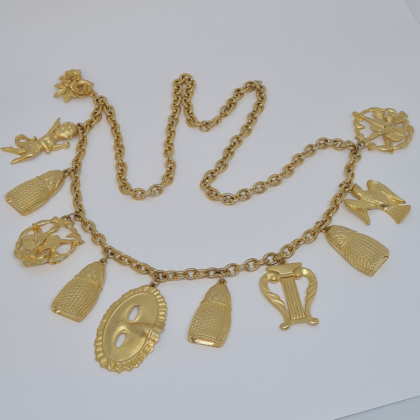Vintage music-themed pendant necklace Gold-tone metal chain with Arfa, tassel, mask, violin pendants Original pendant necklace