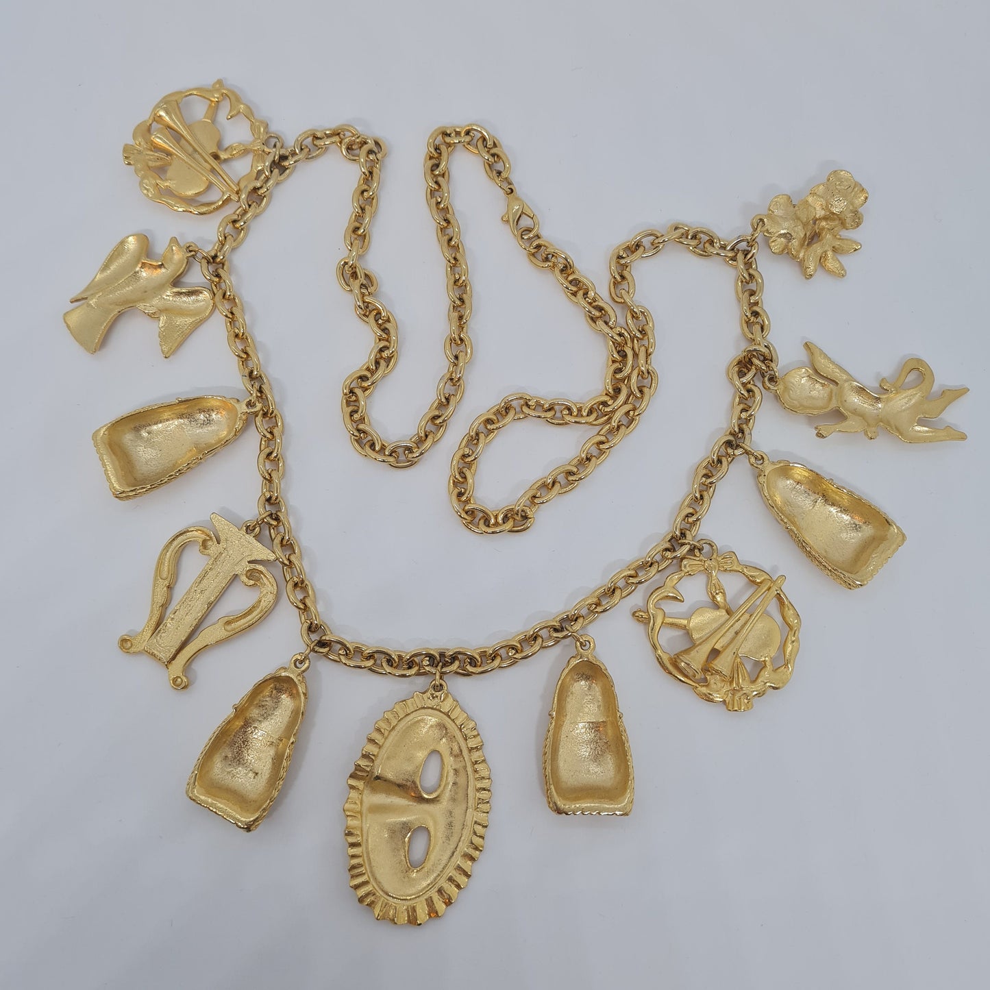 Vintage music-themed pendant necklace Gold-tone metal chain with Arfa, tassel, mask, violin pendants Original pendant necklace