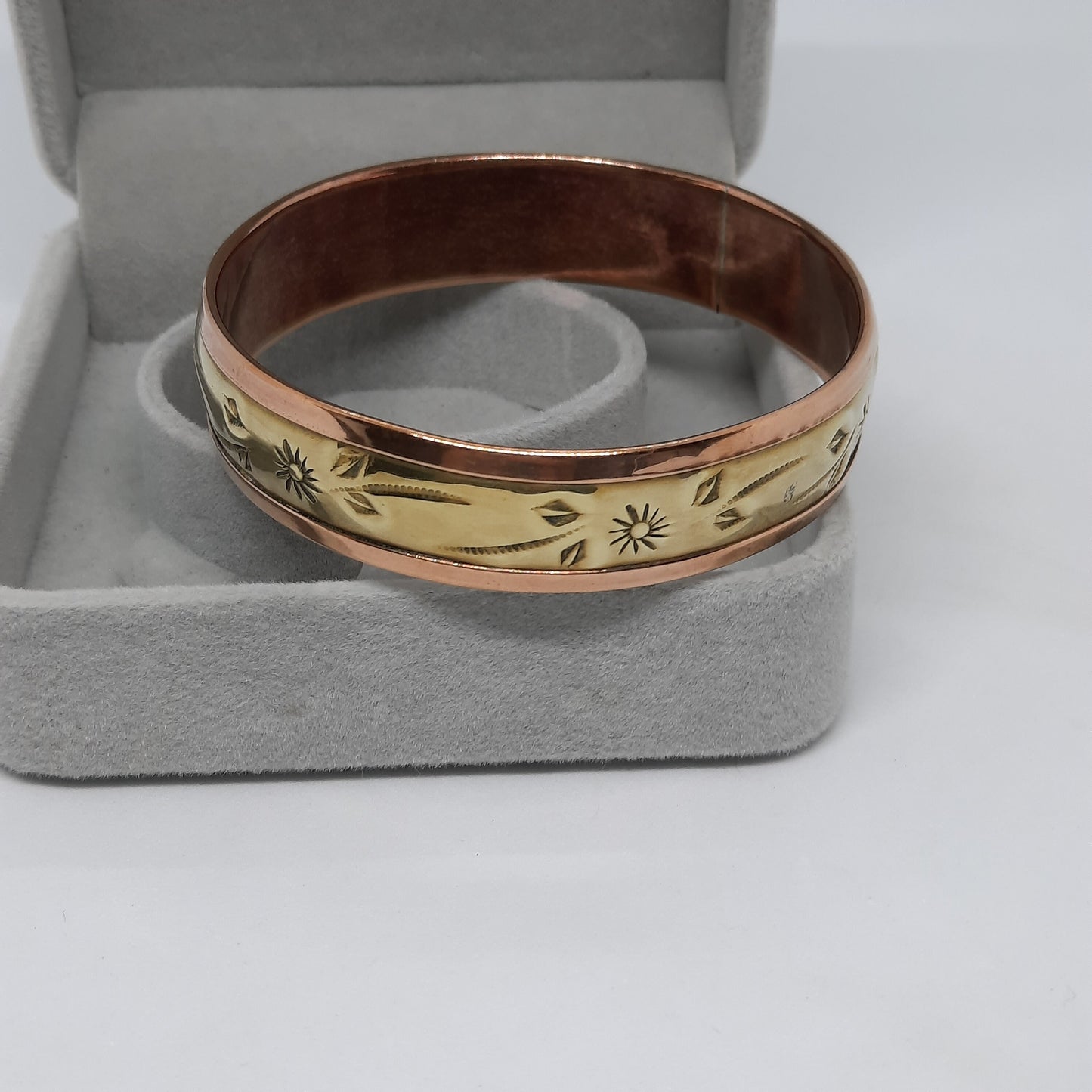 Vintage two-tone bangle bracelet Brass and copper cuff bracelet with floral motif
