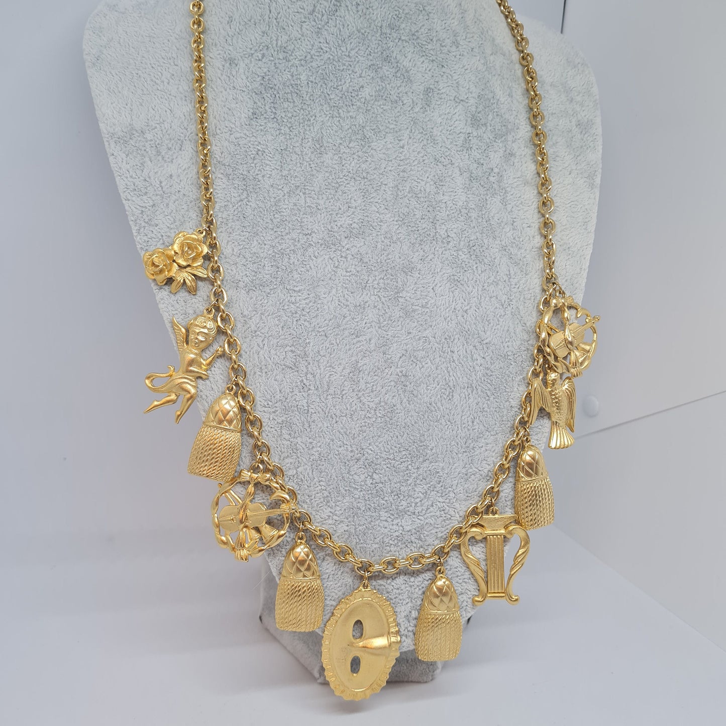 Vintage music-themed pendant necklace Gold-tone metal chain with Arfa, tassel, mask, violin pendants Original pendant necklace