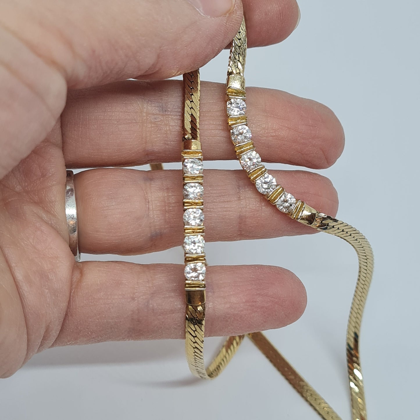 Vintage herringbone necklace set Gold tone metal with clear rhinestones Necklace, bracelet, and earrings sparkly set