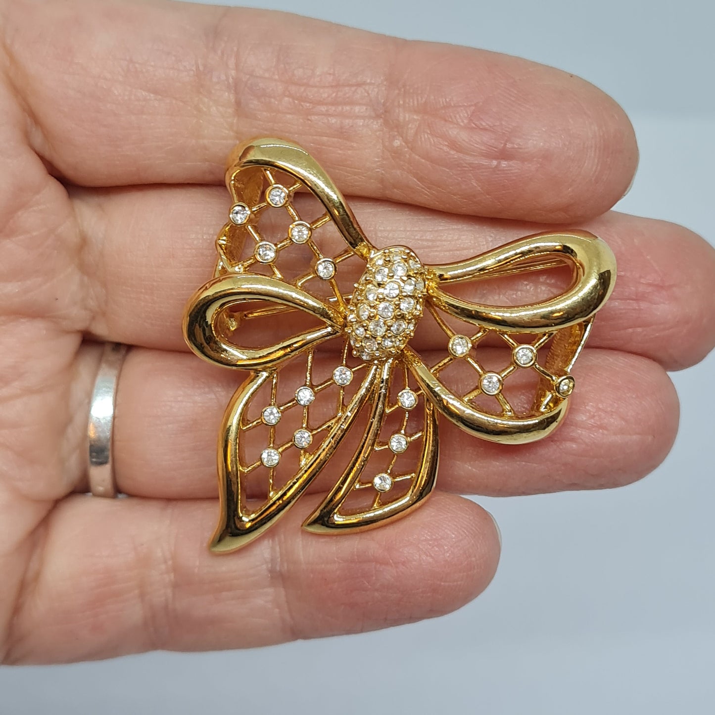 Vintage rhinestone ribbon brooch Gold tone metal with clear rhinestones Sparkly brooch pin