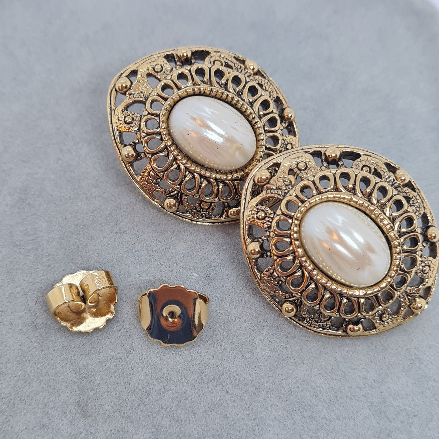 Vintage AVON earrings Gold tone metal with faux pearl cabochon Designer large stud earrings