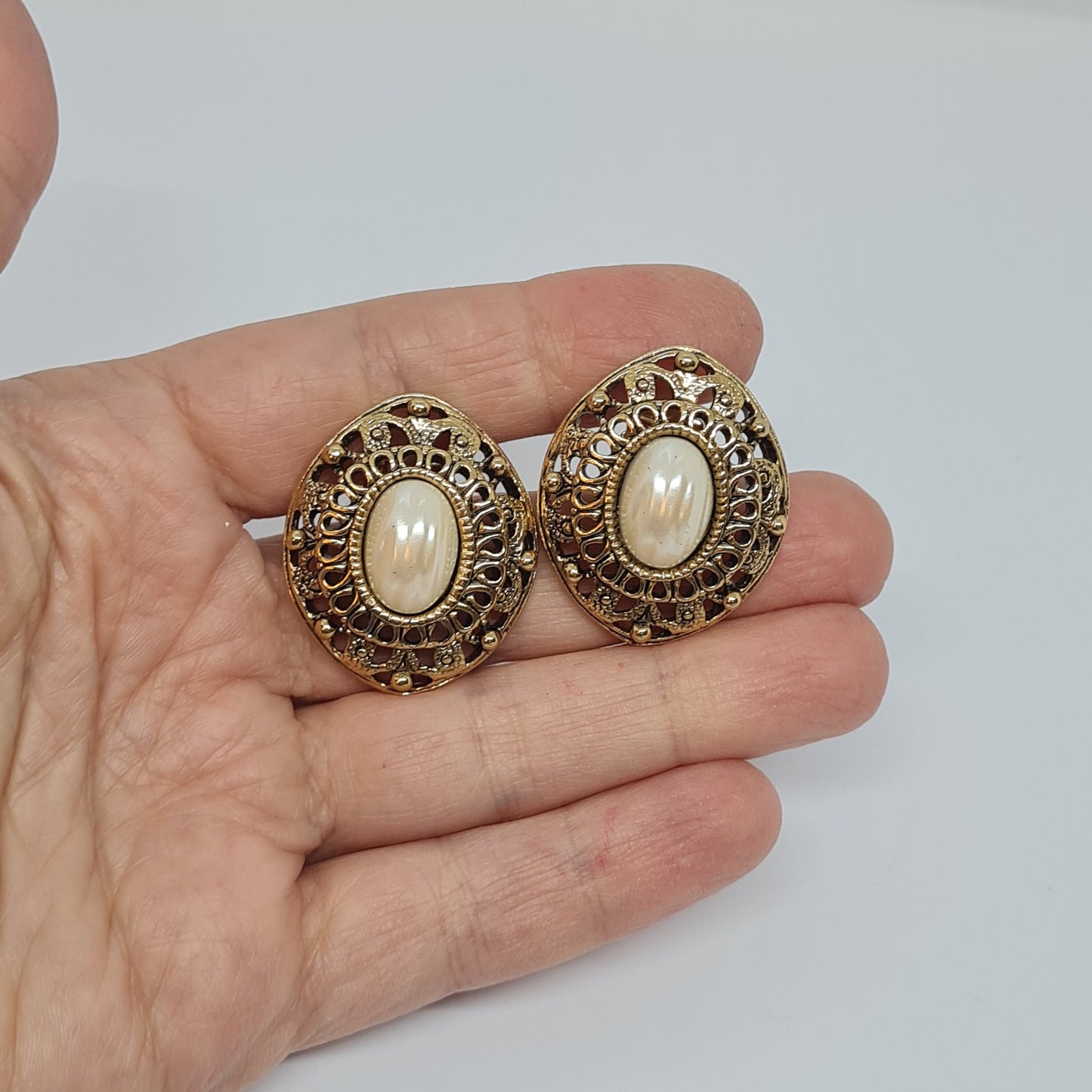 Vintage AVON earrings Gold tone metal with faux pearl cabochon Designer large stud earrings