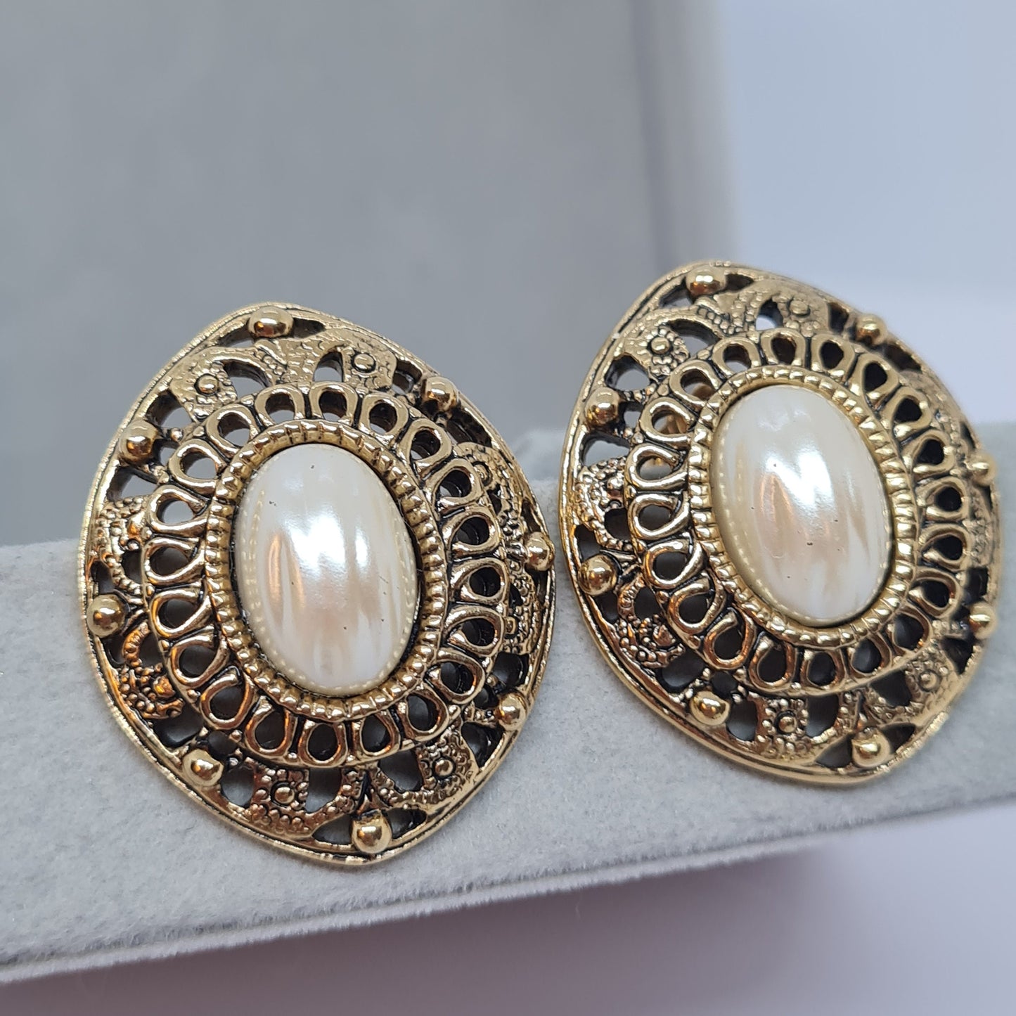 Vintage AVON earrings Gold tone metal with faux pearl cabochon Designer large stud earrings