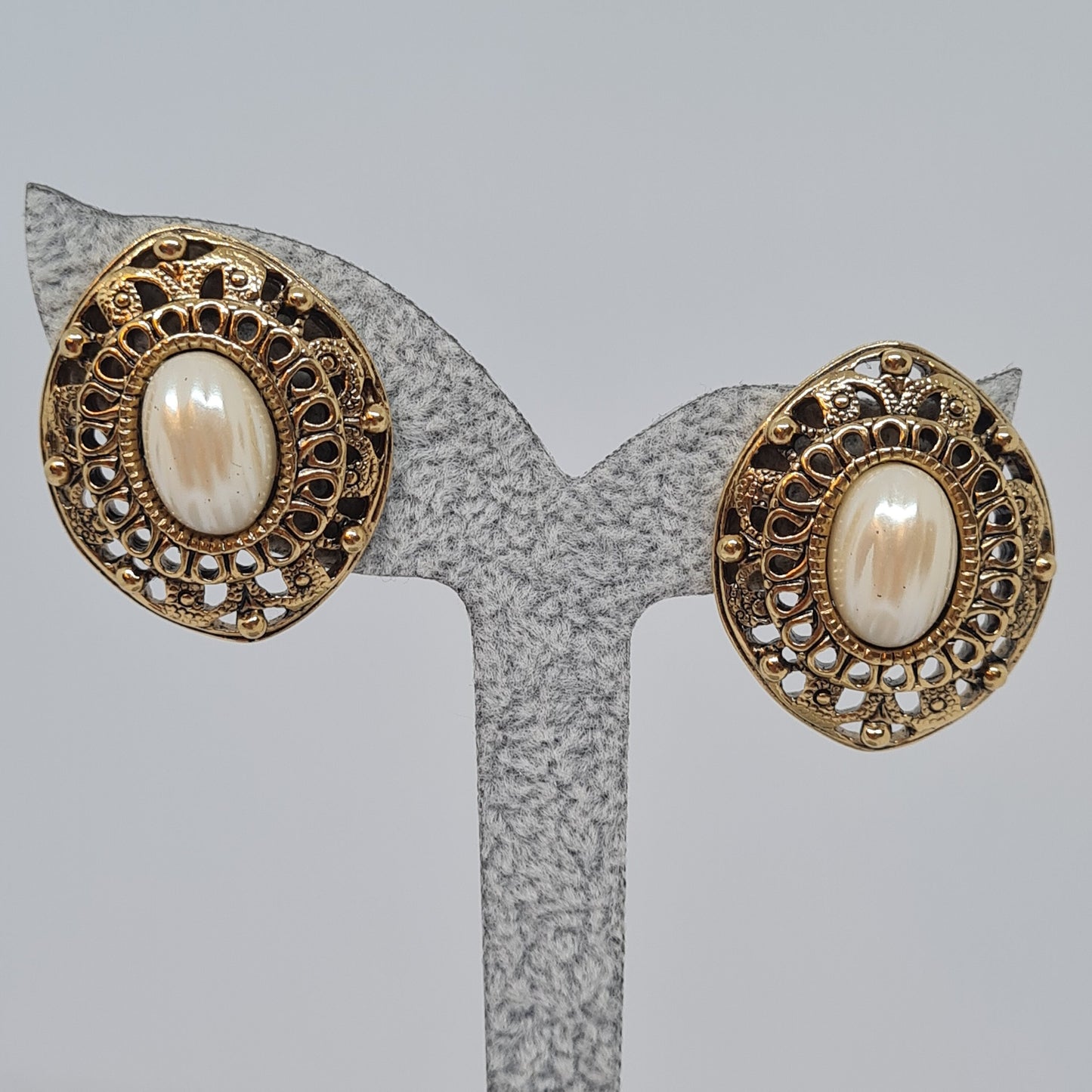 Vintage AVON earrings Gold tone metal with faux pearl cabochon Designer large stud earrings