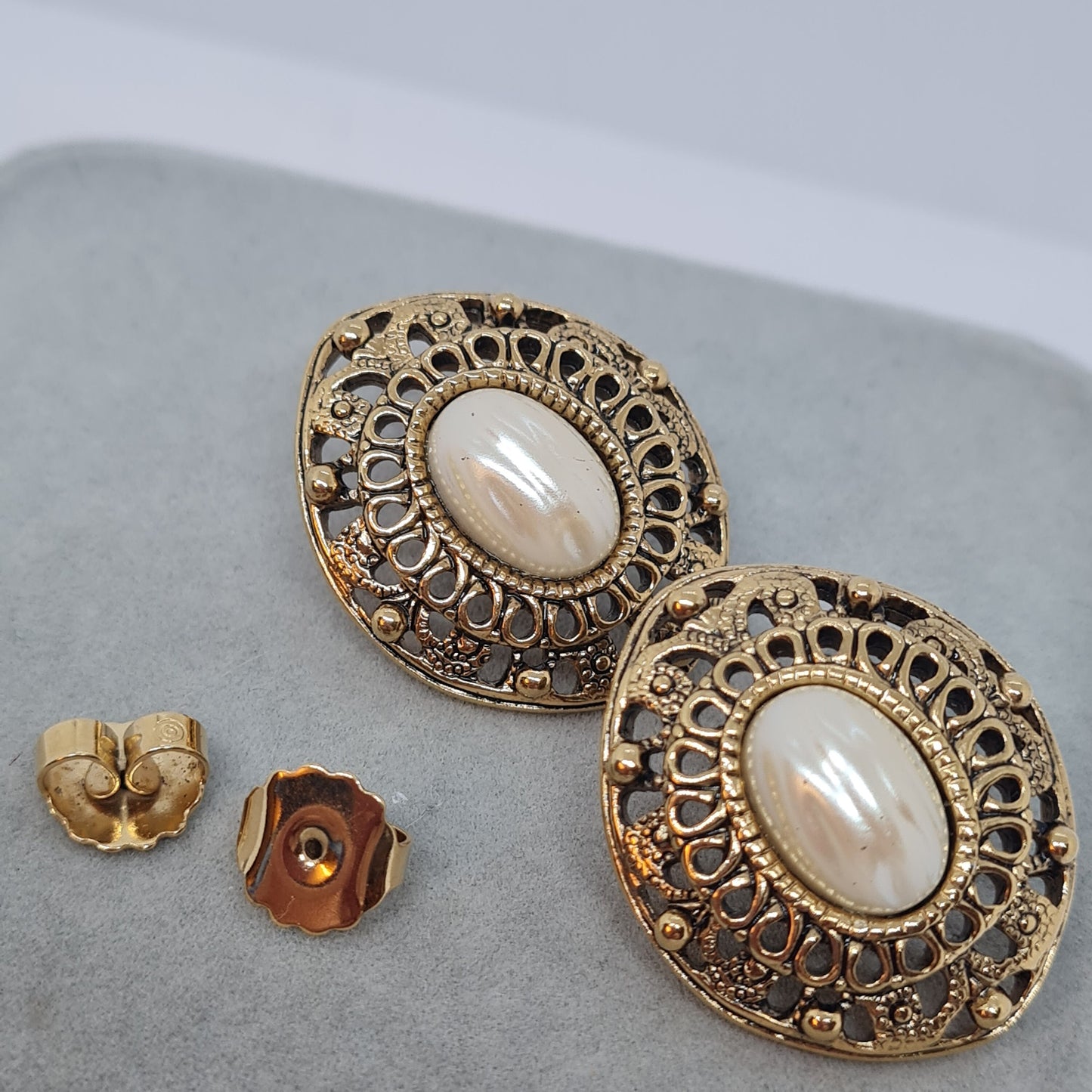 Vintage AVON earrings Gold tone metal with faux pearl cabochon Designer large stud earrings
