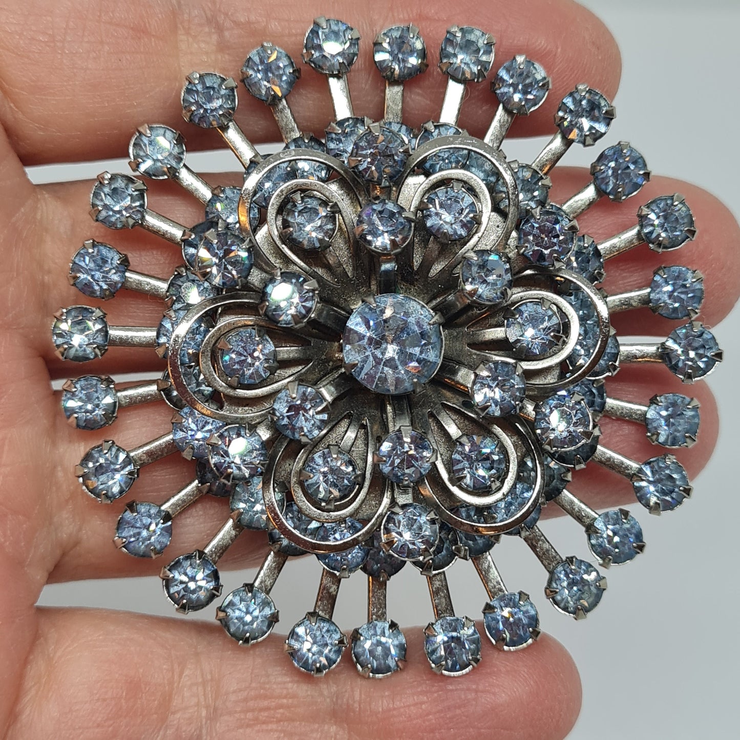 Vintage Floral Brooch: Blue Rhinestone Silver Tone Pin