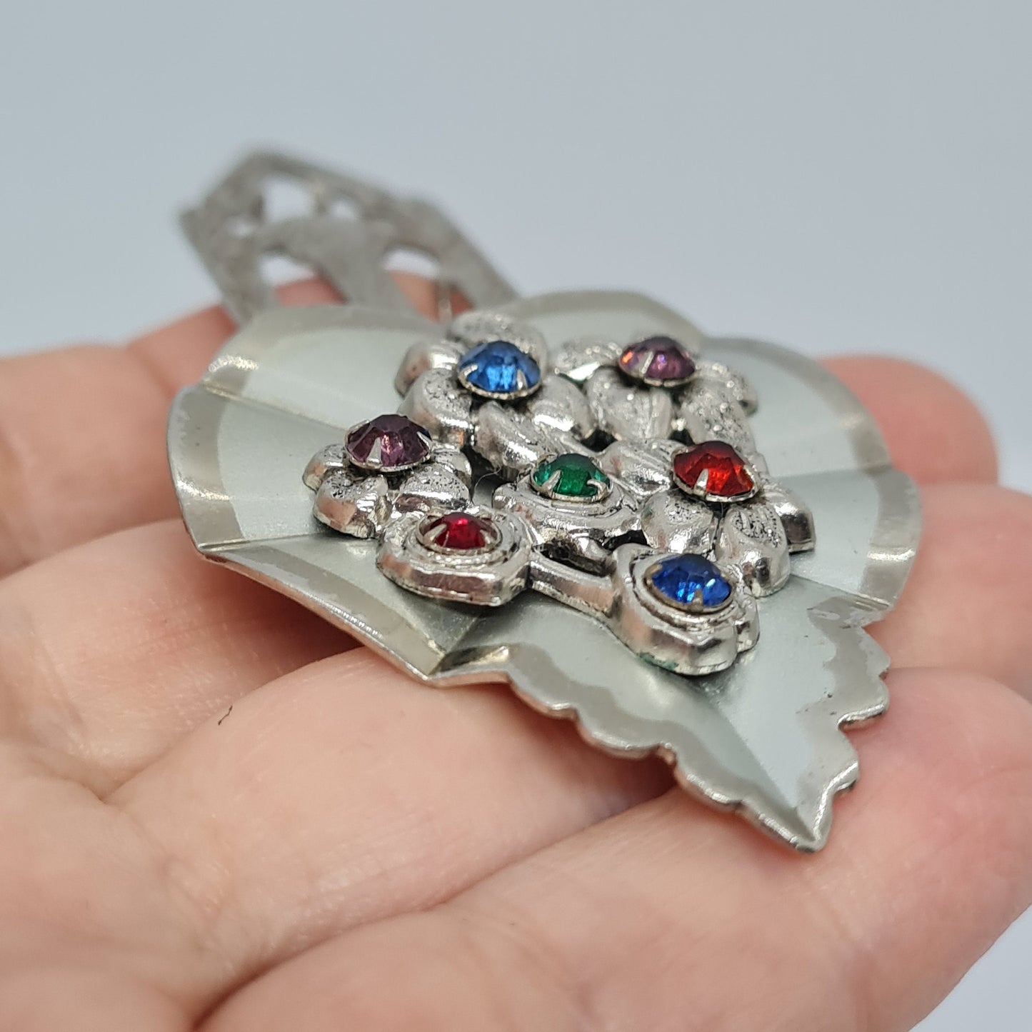Vintage leaf dress clip Silver tone metal with glass red and blue rhinestones Floral dress clip