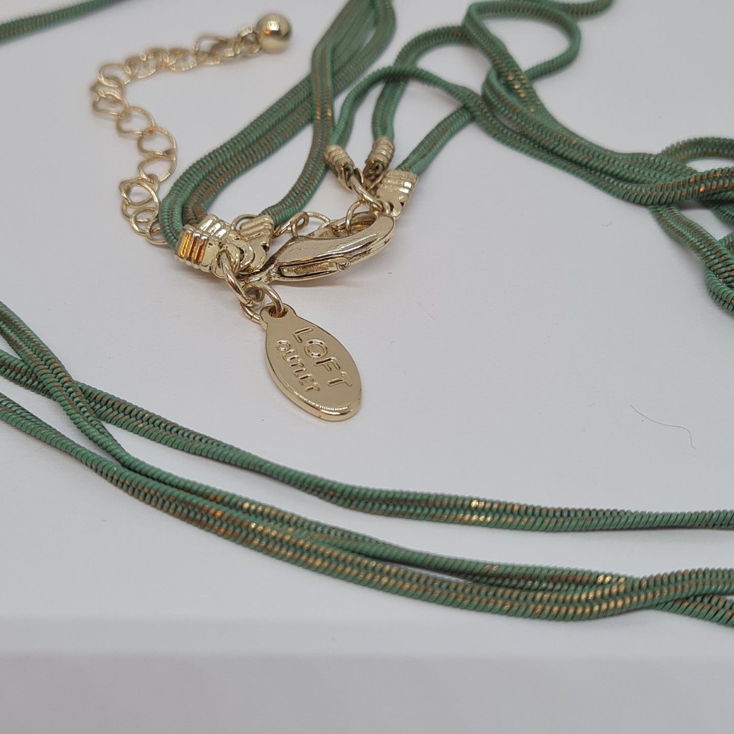 ANN TAYLOR- LOFT three-strand chain necklace Vintage gold-tone metal with green-tone chain Designer long necklace