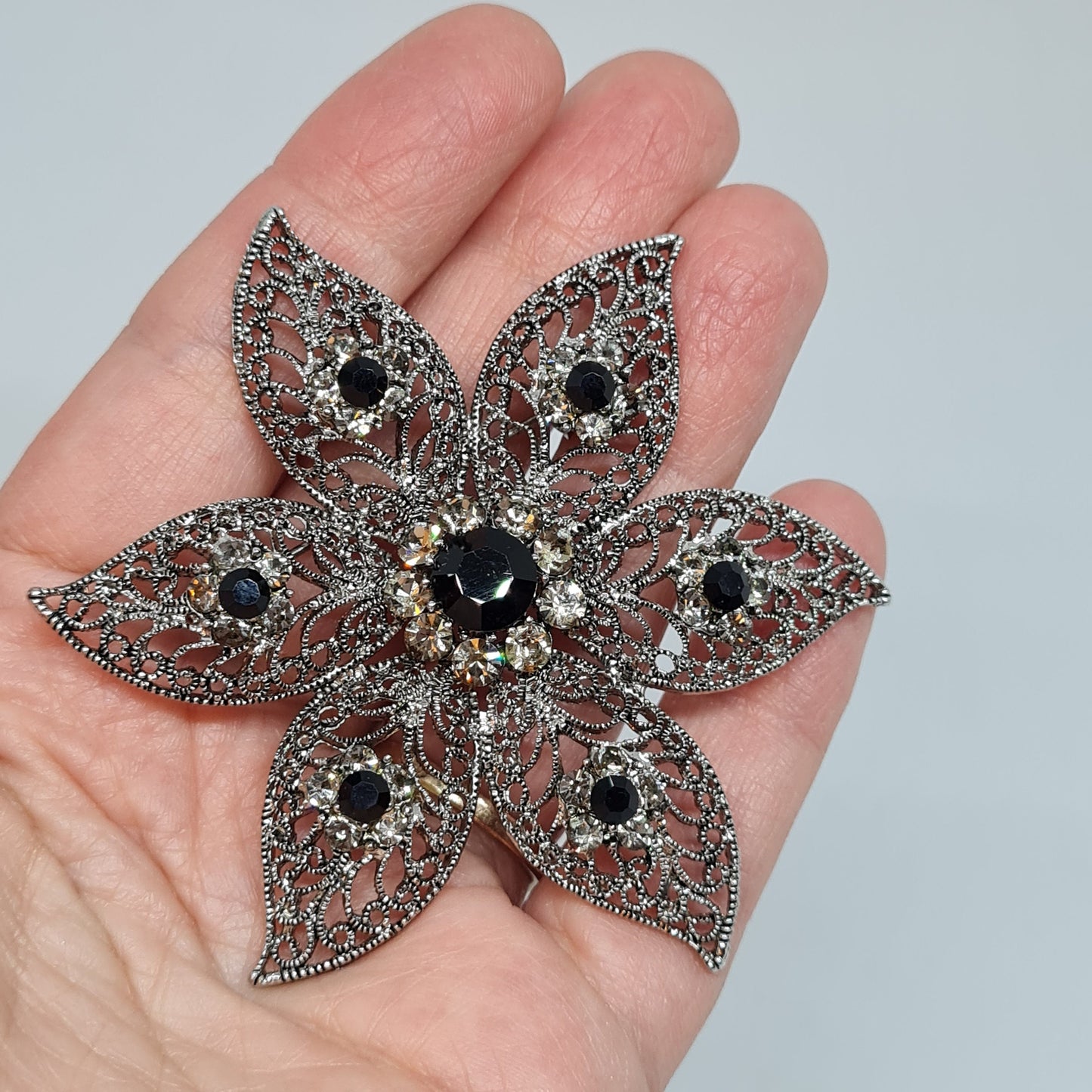 Vintage filigree large brooch Silver tone metal with glass black and clear rhinestones brooch Big floral sparkly brooch pin