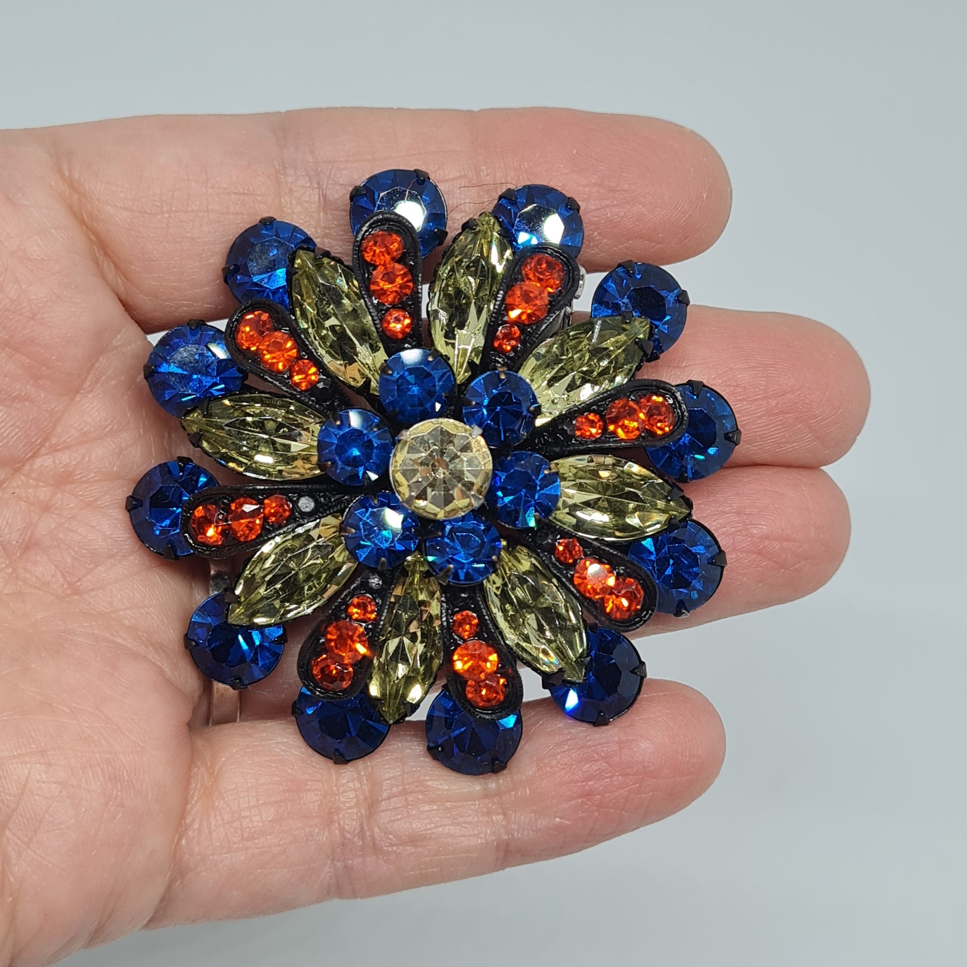 Awesome vintage brooch Black tone metal with blue,yellow and red glass rhinestones brooch pin
