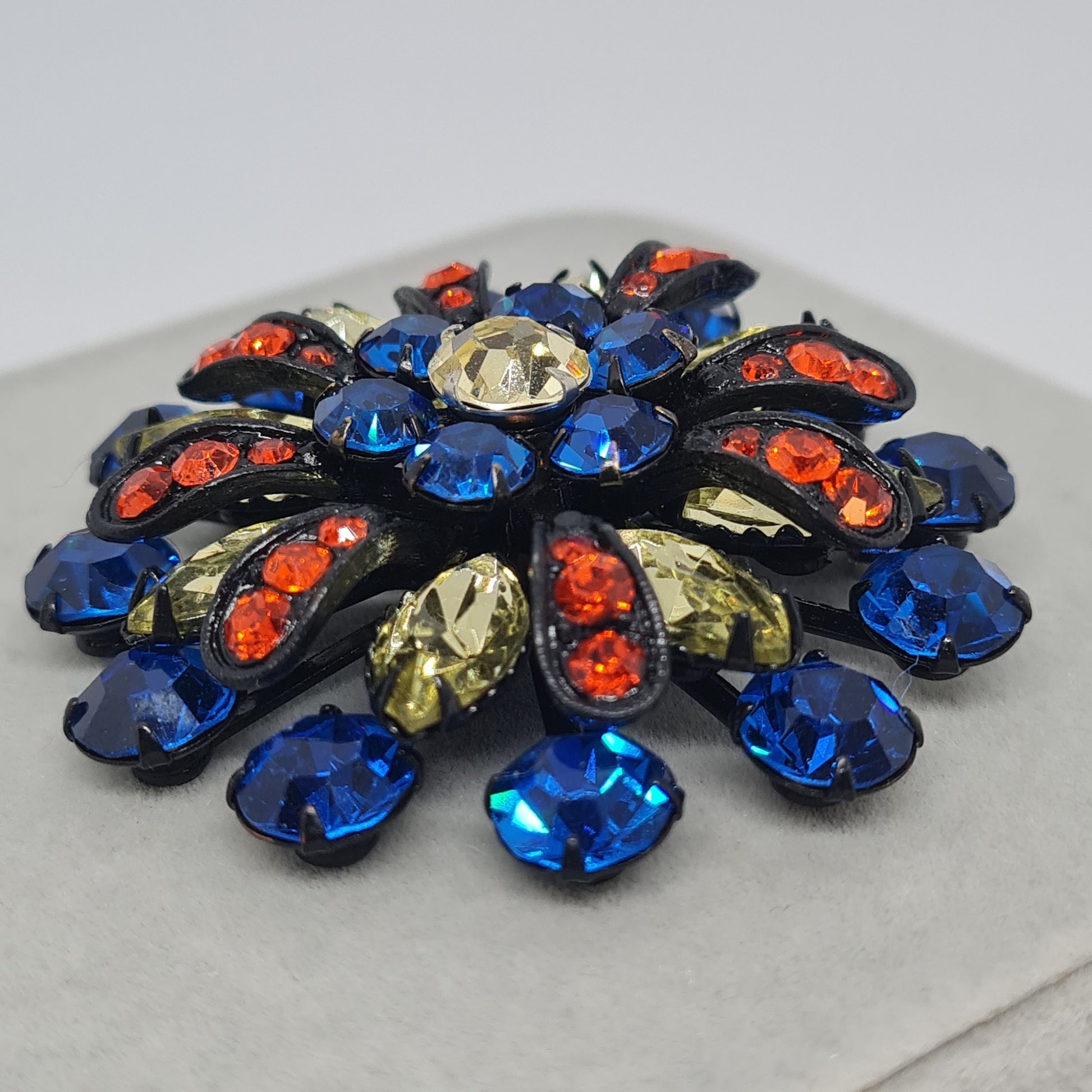 Awesome vintage brooch Black tone metal with blue,yellow and red glass rhinestones brooch pin