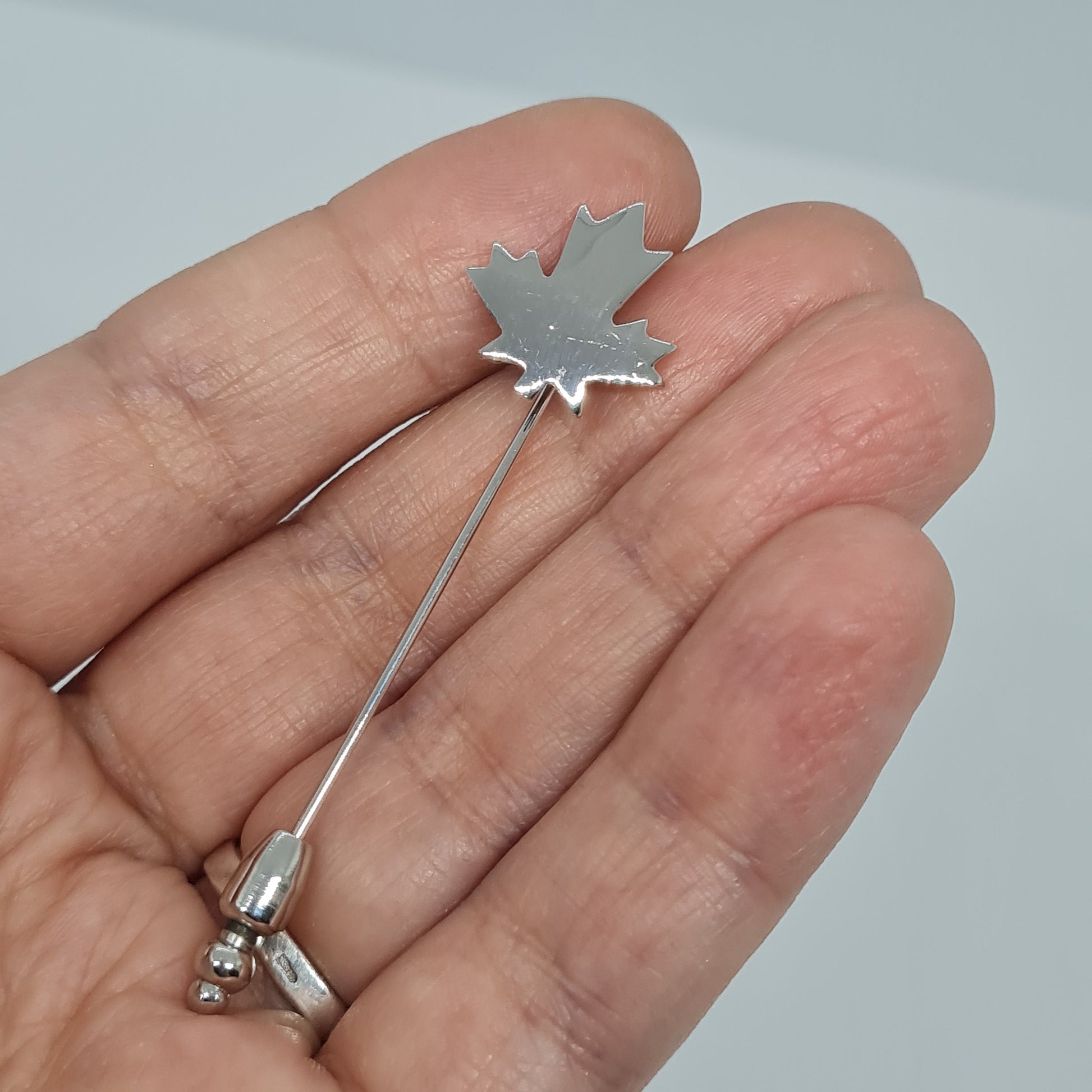 Vintage TRIFARI leaf stick pin Gloss silver tone metal Designer maple leaf stick pin