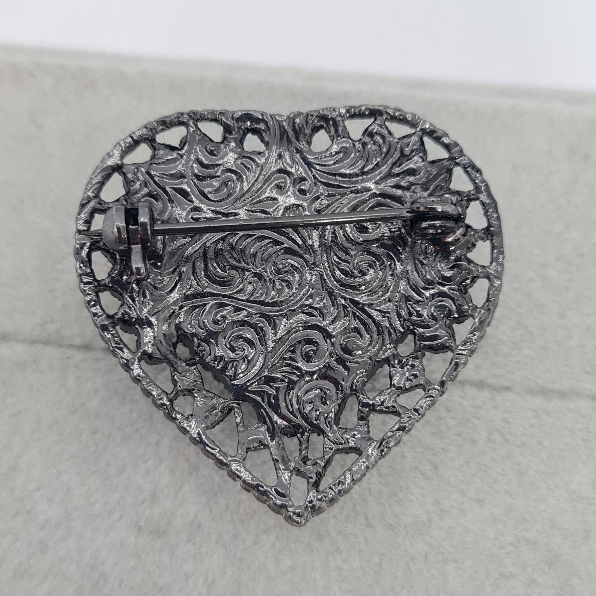 Vintage 1928 jewelry heart brooch Black tone metal and rhinestones brooch with plastic heart cabochon Designer floral brooch pin