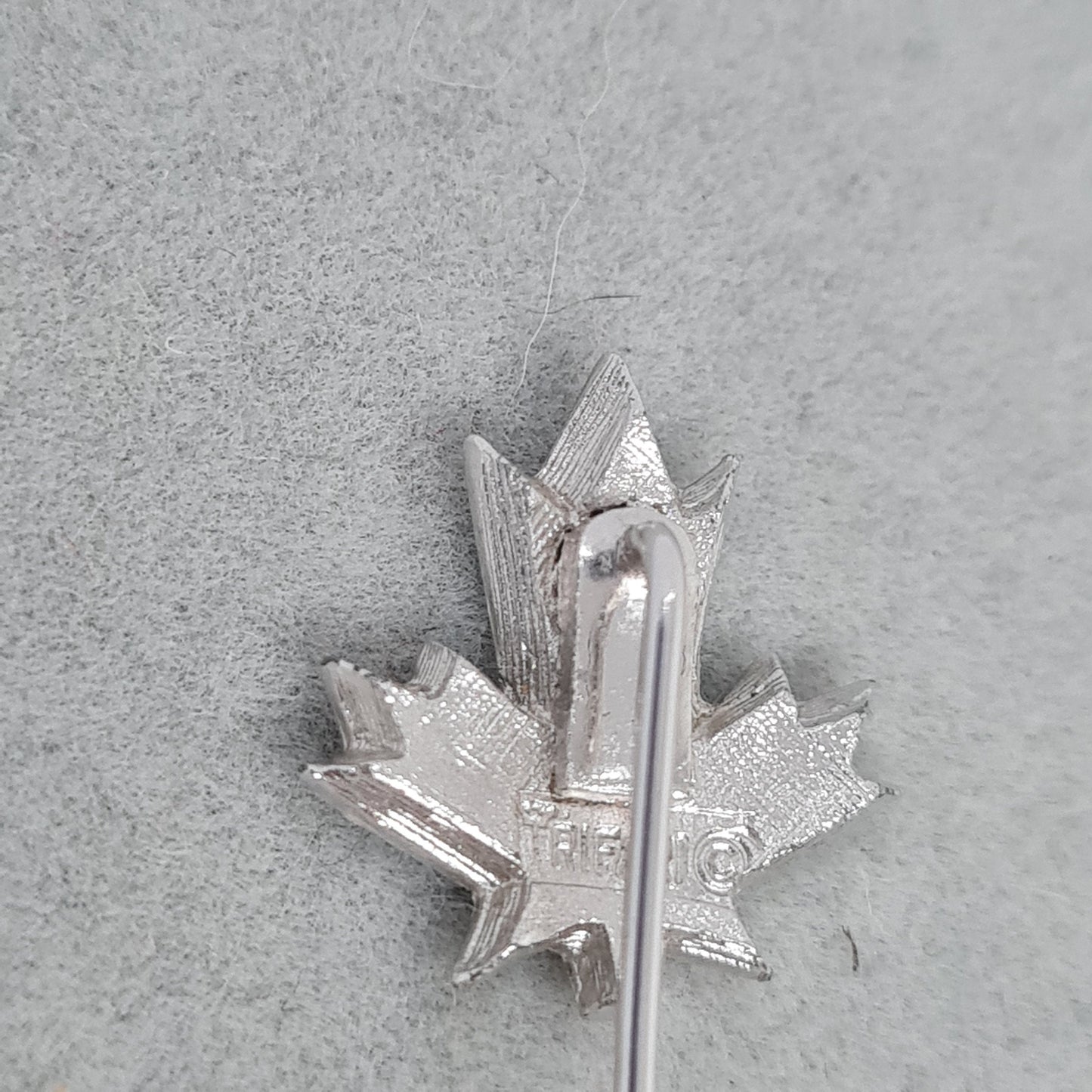 Vintage TRIFARI leaf stick pin Gloss silver tone metal Designer maple leaf stick pin