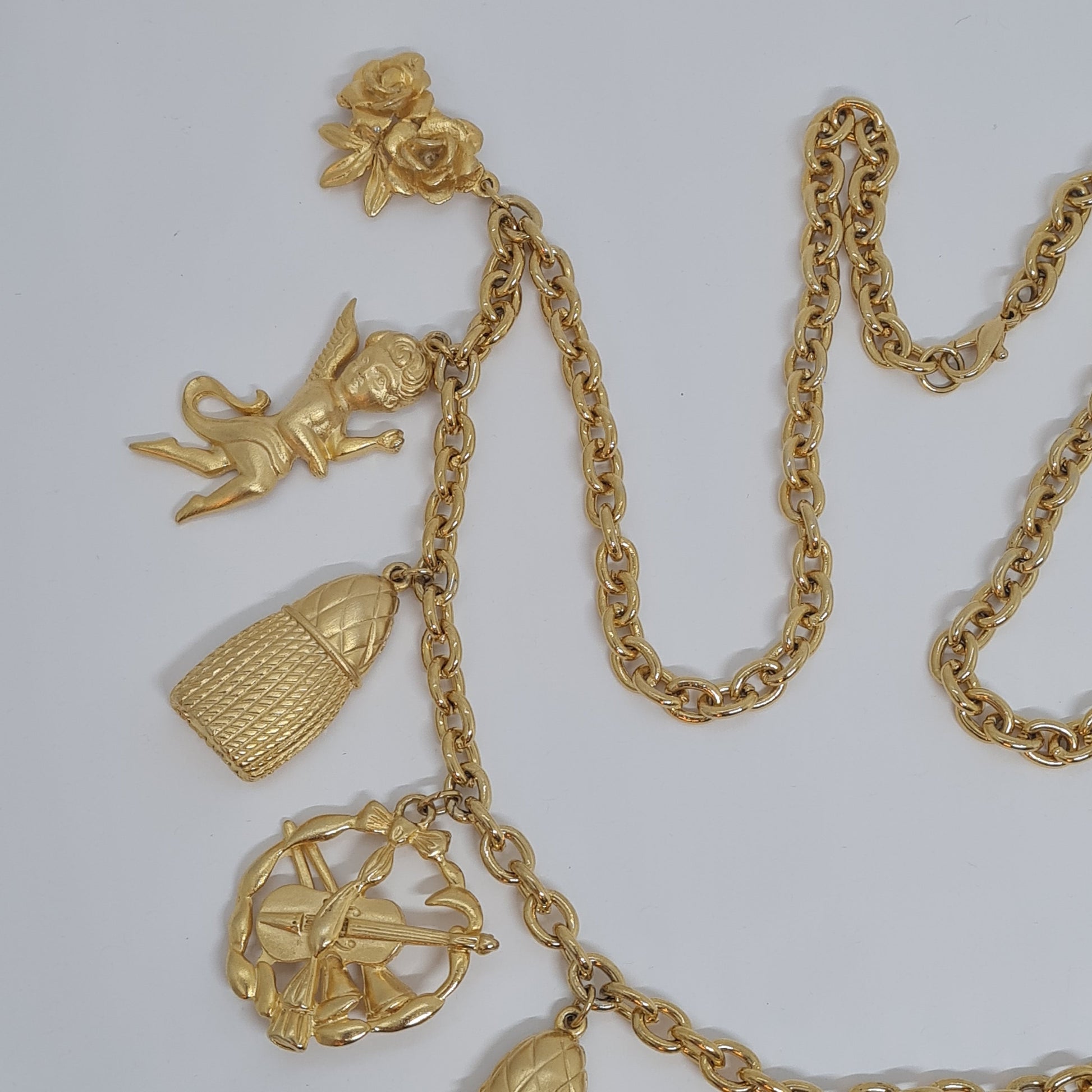 Vintage music-themed pendant necklace Gold-tone metal chain with Arfa, tassel, mask, violin pendants Original pendant necklace