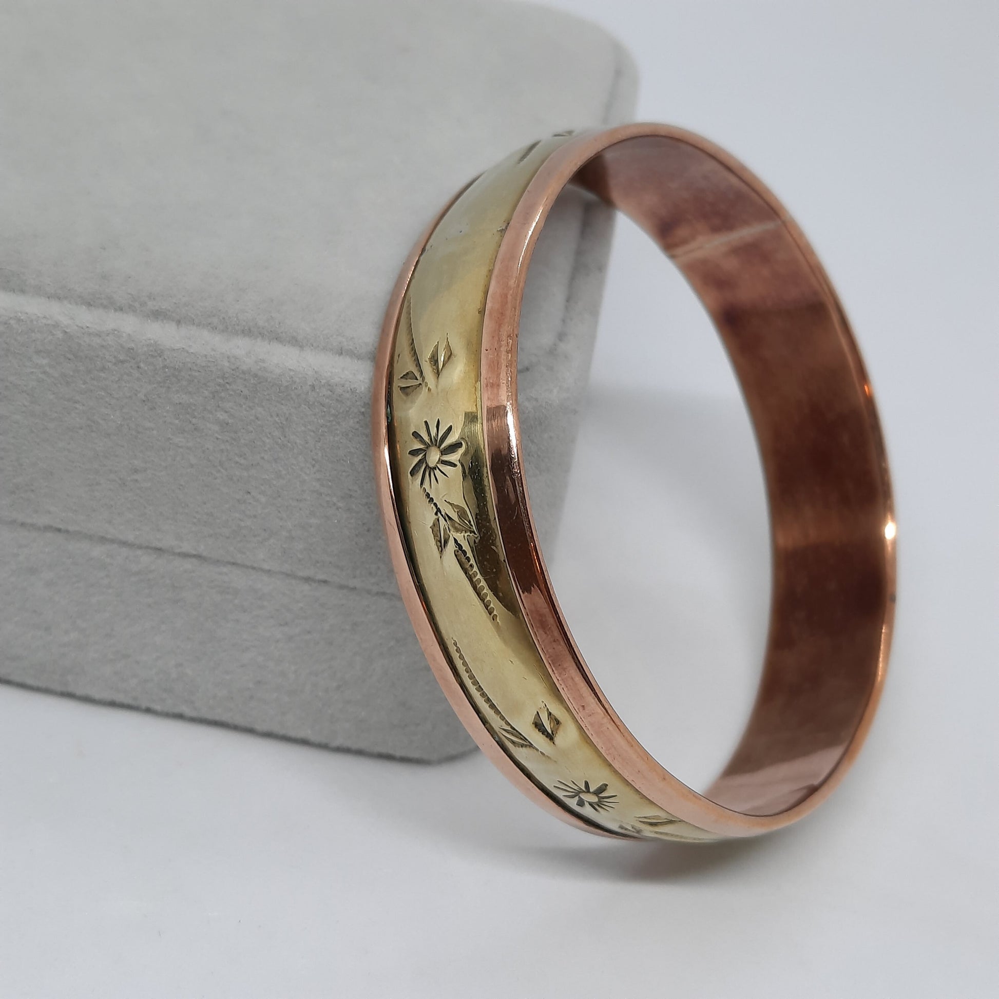 Vintage two-tone bangle bracelet Brass and copper cuff bracelet with floral motif