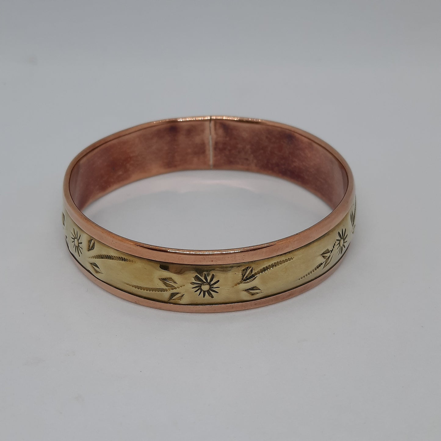 Vintage two-tone bangle bracelet Brass and copper cuff bracelet with floral motif