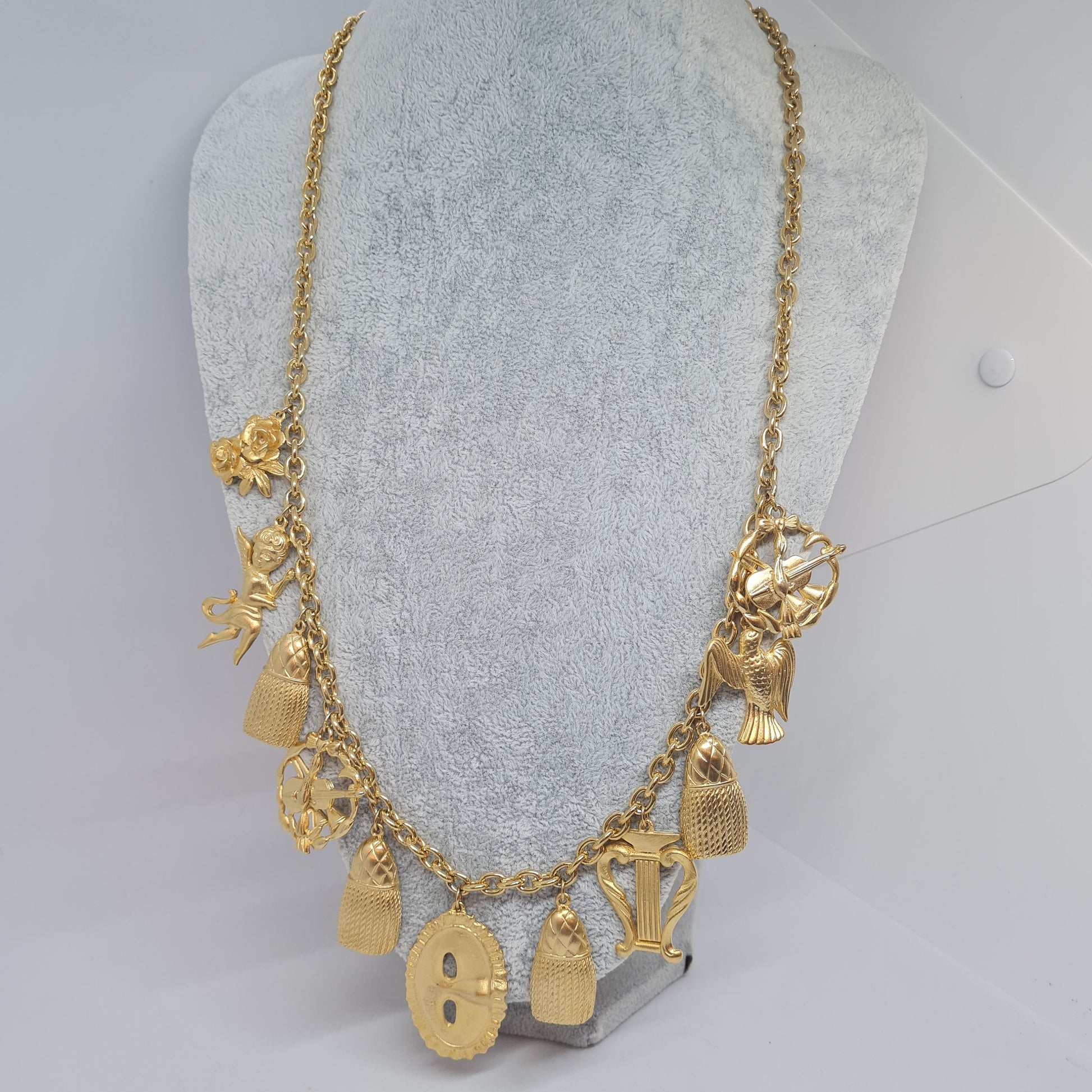 Vintage music-themed pendant necklace Gold-tone metal chain with Arfa, tassel, mask, violin pendants Original pendant necklace
