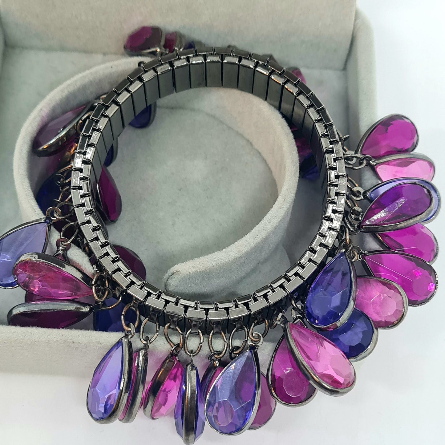 Vintage expanding flex bracelet with purple plastic bezel charms Black tone metal cha cha bracelet