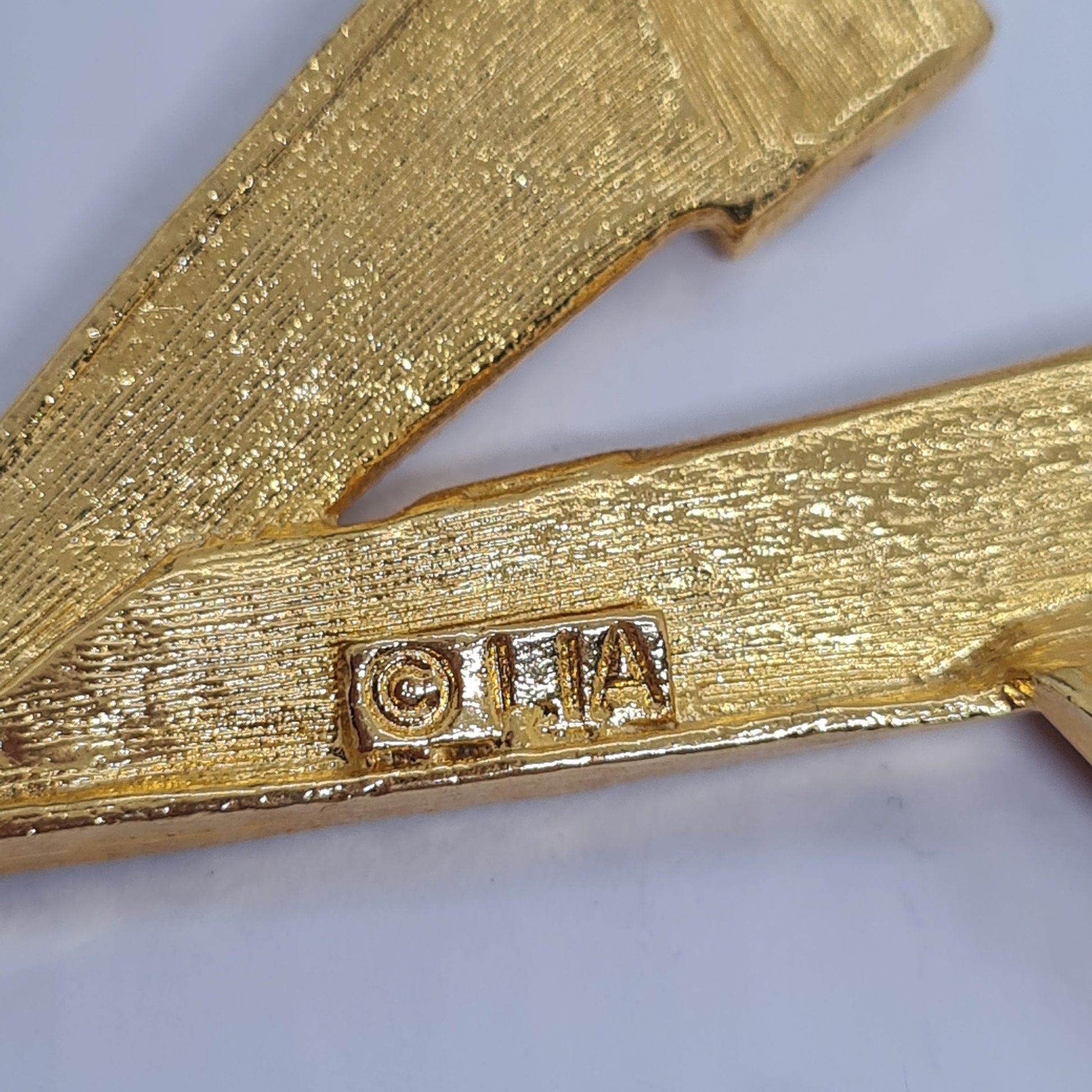 Vintage LIA Star Brooch: Gold Tone Metal with Red Enamel