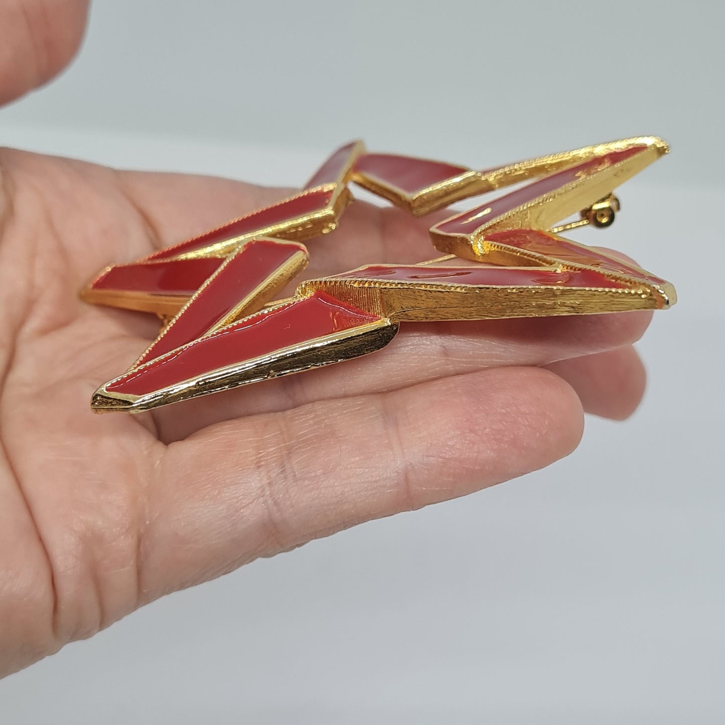 Vintage LIA Star Brooch: Gold Tone Metal with Red Enamel