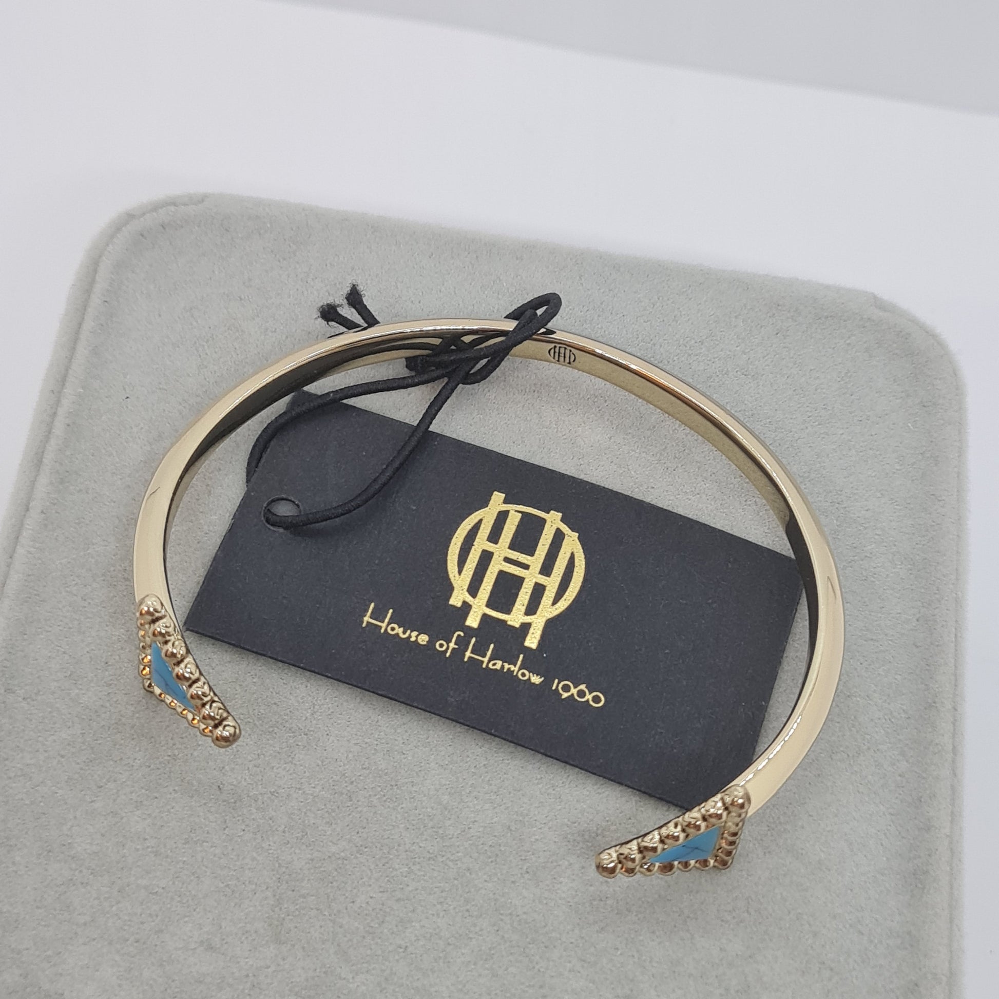 Vintage HOUSE OF HARLOW cuff bracelet Gold tone metal with blue triangle details cuff bracelet