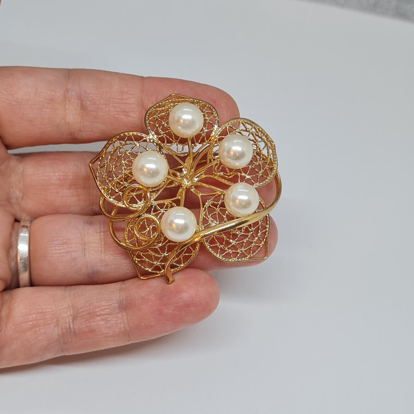 Vintage filigree flower brooch Gold-tone metal with faux pearl floral brooch pin