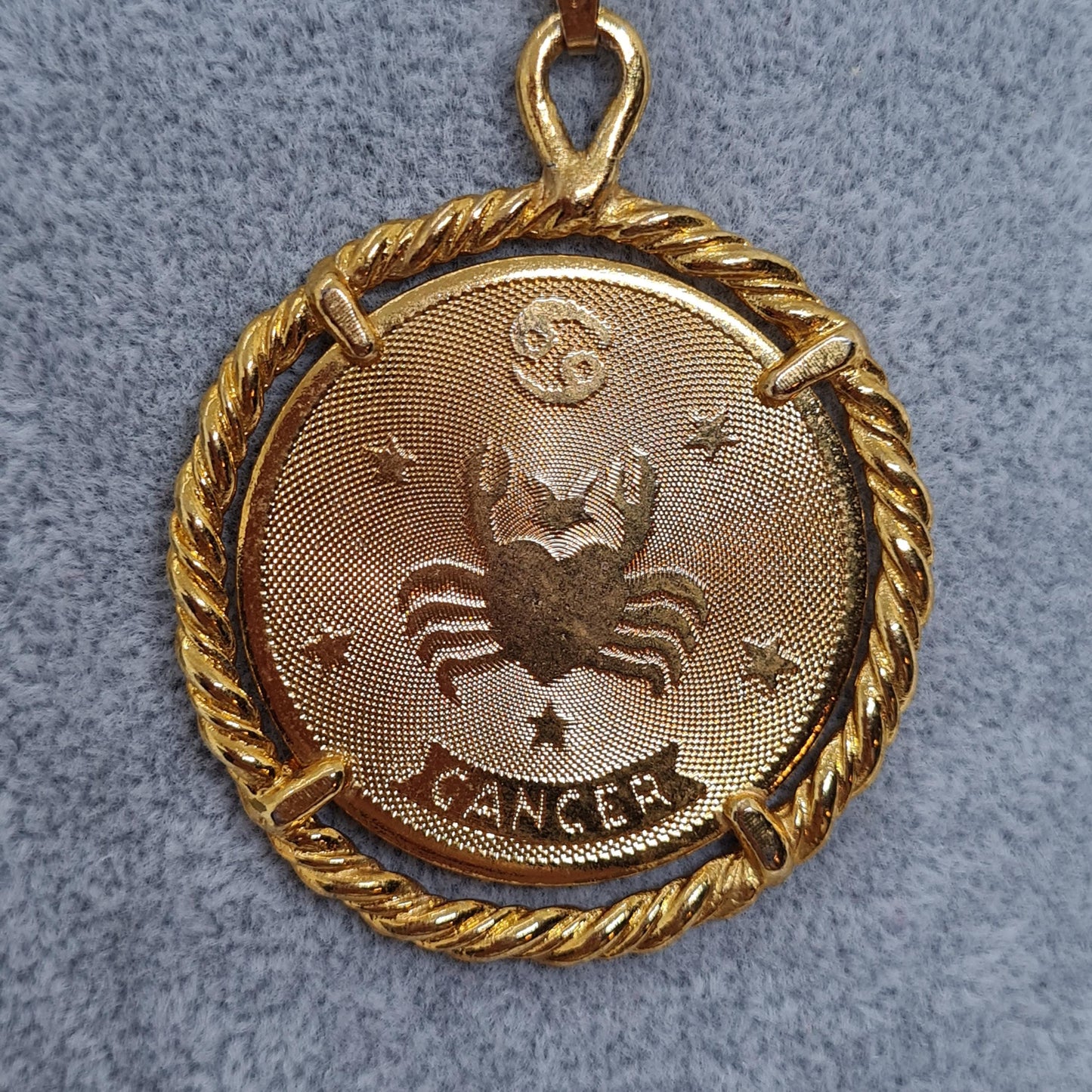 Vintage CANCER zodiac sign pendant necklace. Gold-tone chain and coin pendant in a rope circle.