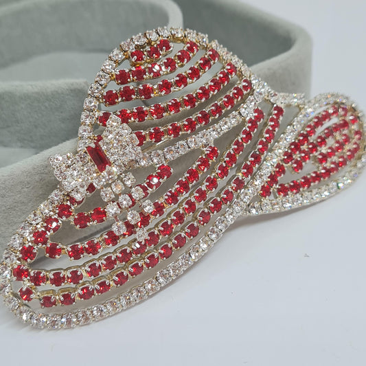Vintage OTC hat brooch. Silver-tone metal with red and clear rhinestones. Awesome large sparkly brooch pin.