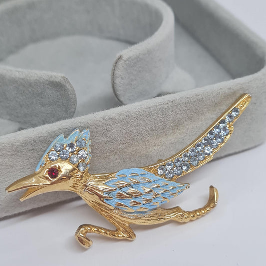 Vintage roadrunner brooch. Gold tone metal with blue enamel and rhinestone. Awesome bird brooch pin.