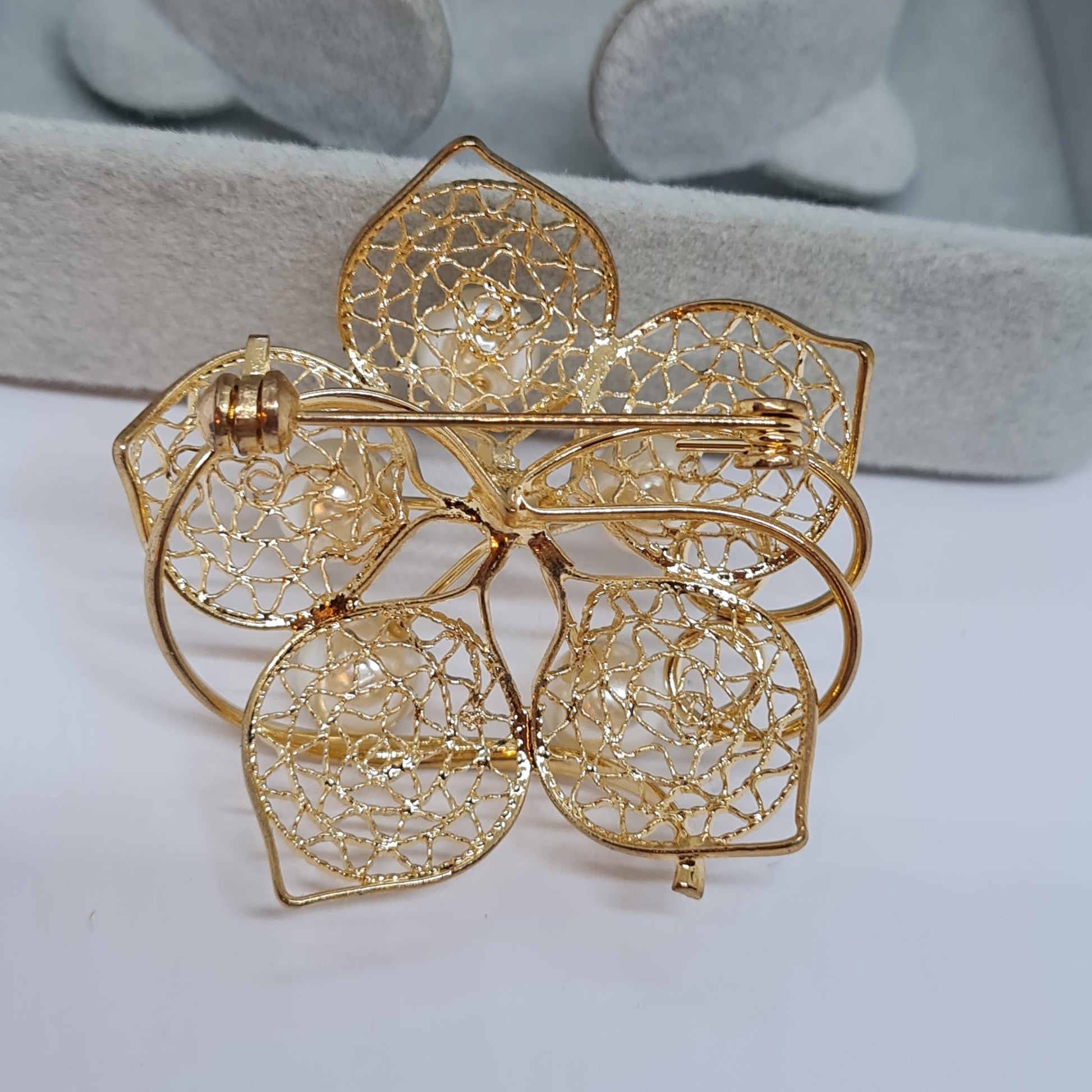 Vintage filigree flower brooch Gold-tone metal with faux pearl floral brooch pin