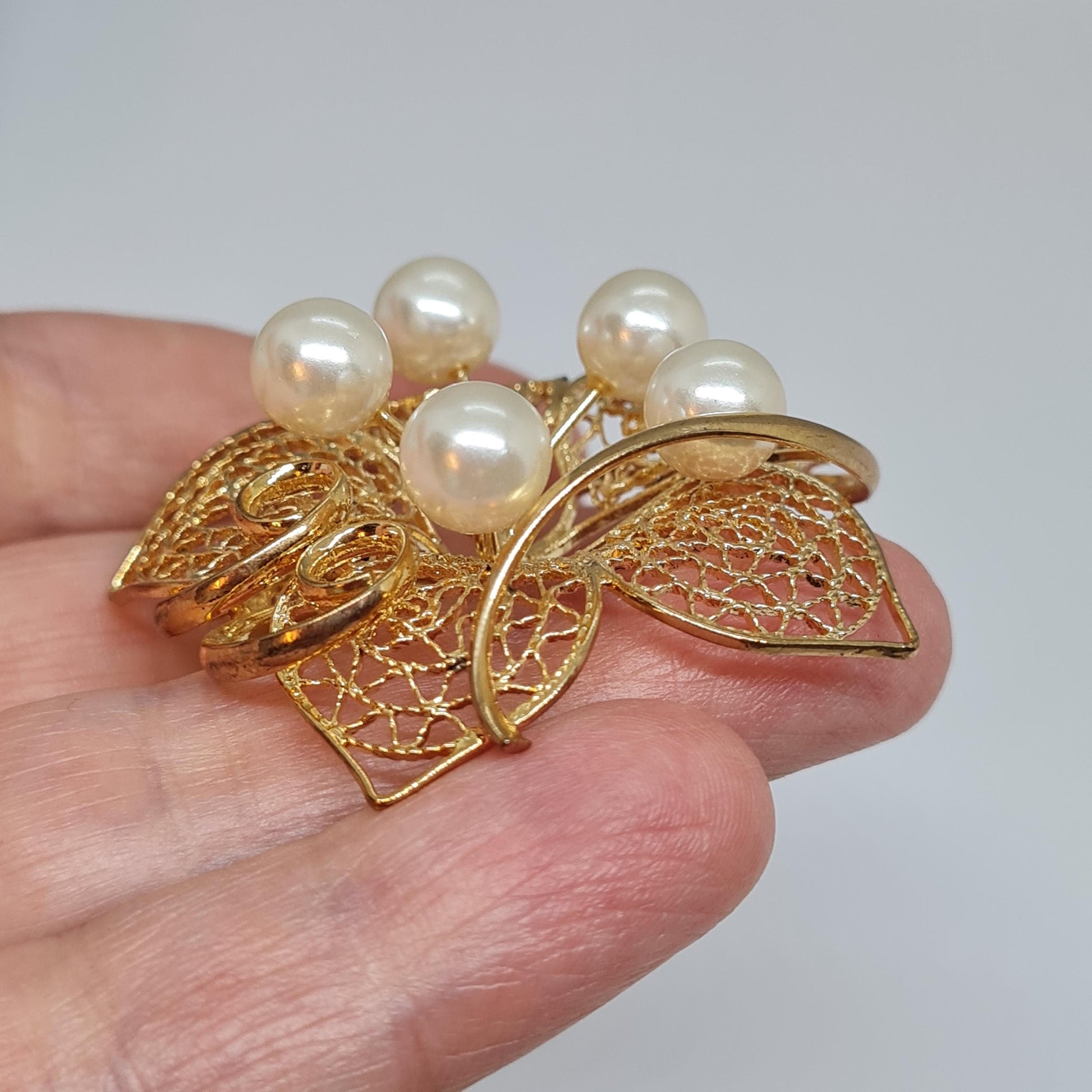 Vintage filigree flower brooch Gold-tone metal with faux pearl floral brooch pin