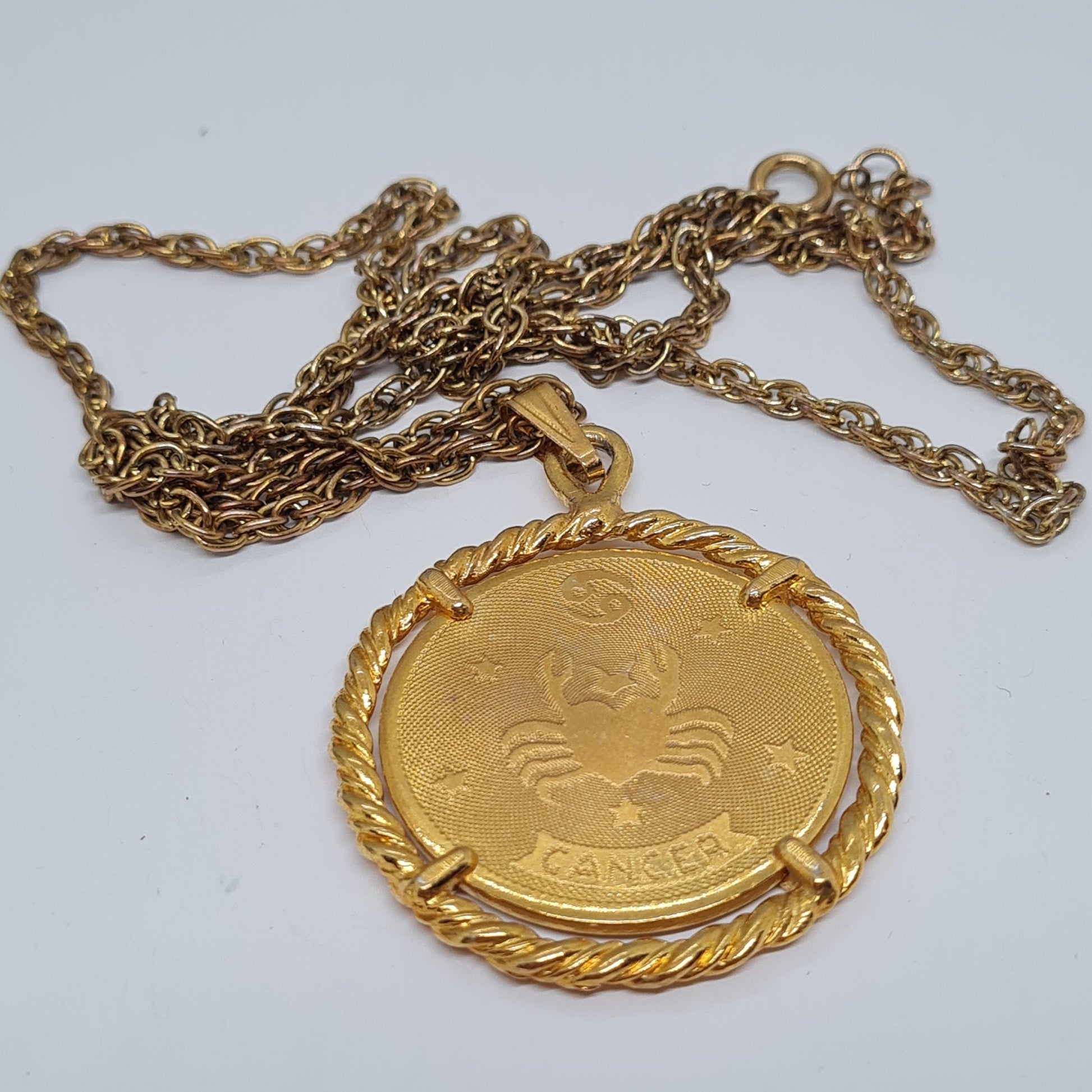 Vintage CANCER zodiac sign pendant necklace Gold-tone chain and coin pendant in a rope circle
