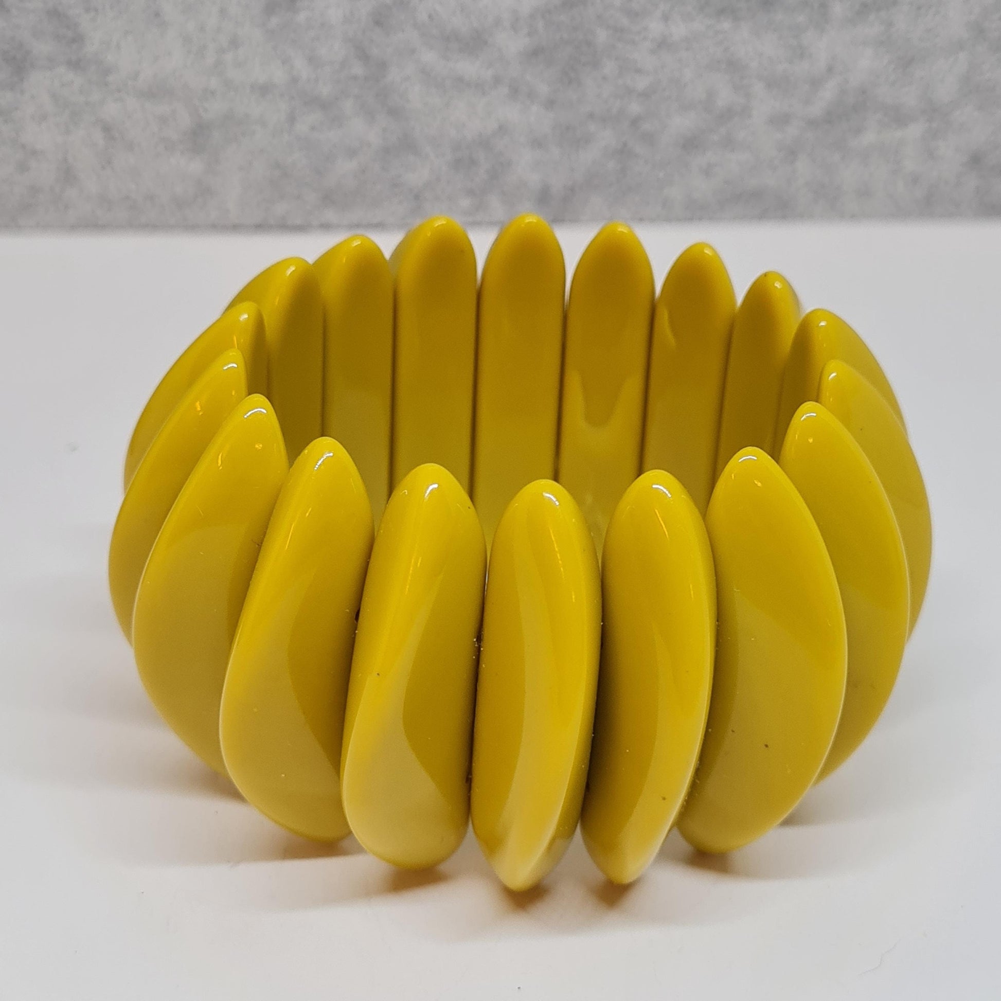 Vintage plastic stretchy bracelet. Olive color adjustable bracelet.