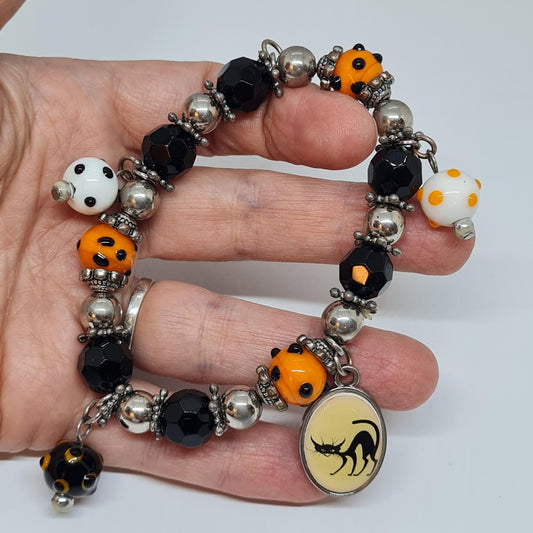 Vintage Halloween stretchy bracelet with black glass and lampwork beads.