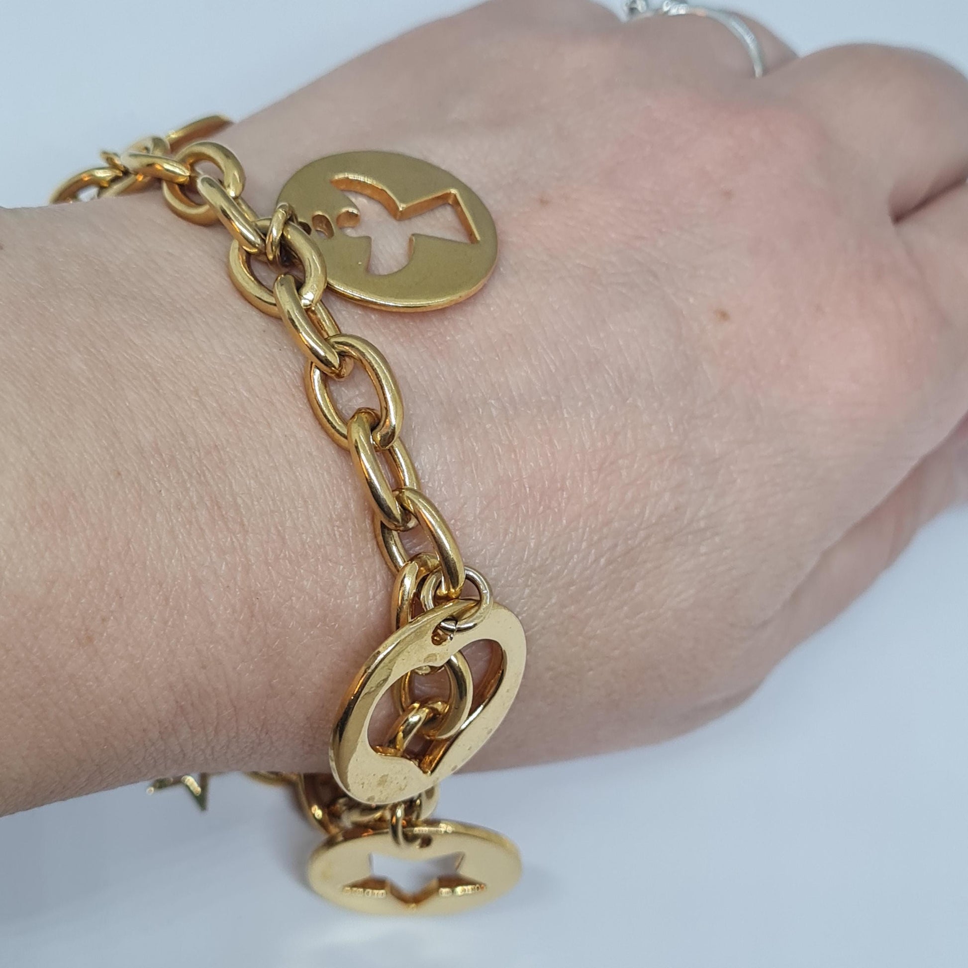 Vintage AVON Gold-Tone Charm Bracelet: Heart, Angel, Star Charms