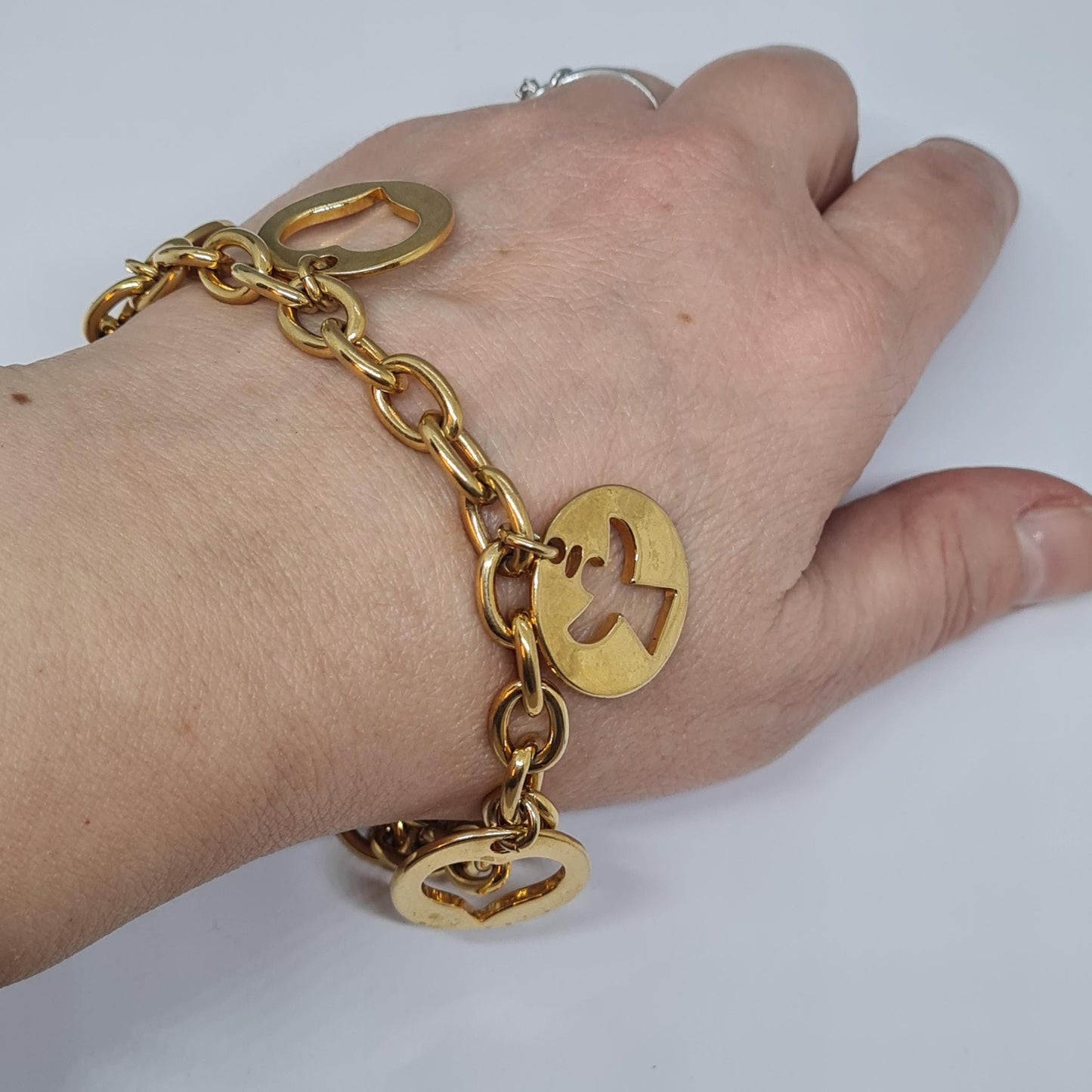 Vintage AVON Gold-Tone Charm Bracelet: Heart, Angel, Star Charms