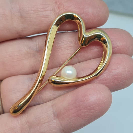 Vintage abstract heart brooch. Gloss gold-tone metal brooch pin with faux pearl. Valentine&#39;s Day gift.