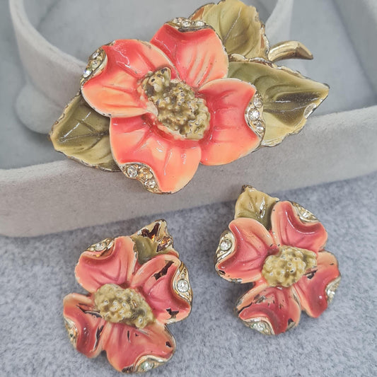 Vintage floral jewelry set, Gold-tone metal, glass rhinestone, Red and green enamel brooch, and clip-on earrings set