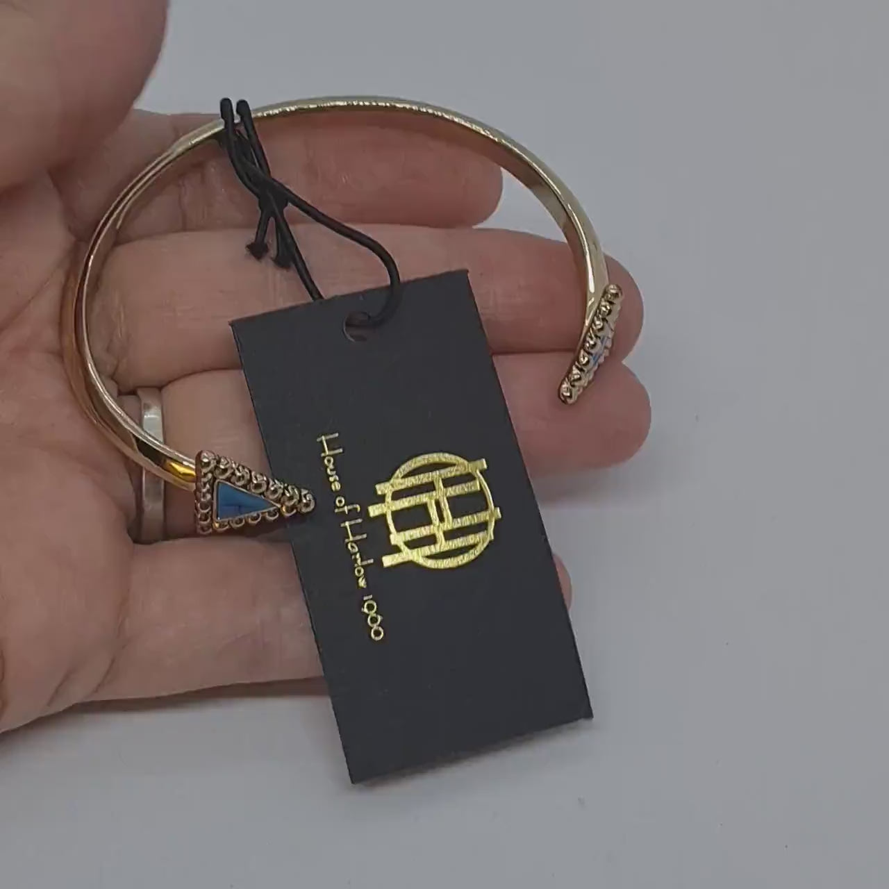 Vintage HOUSE OF HARLOW cuff bracelet Gold tone metal with blue triangle details cuff bracelet